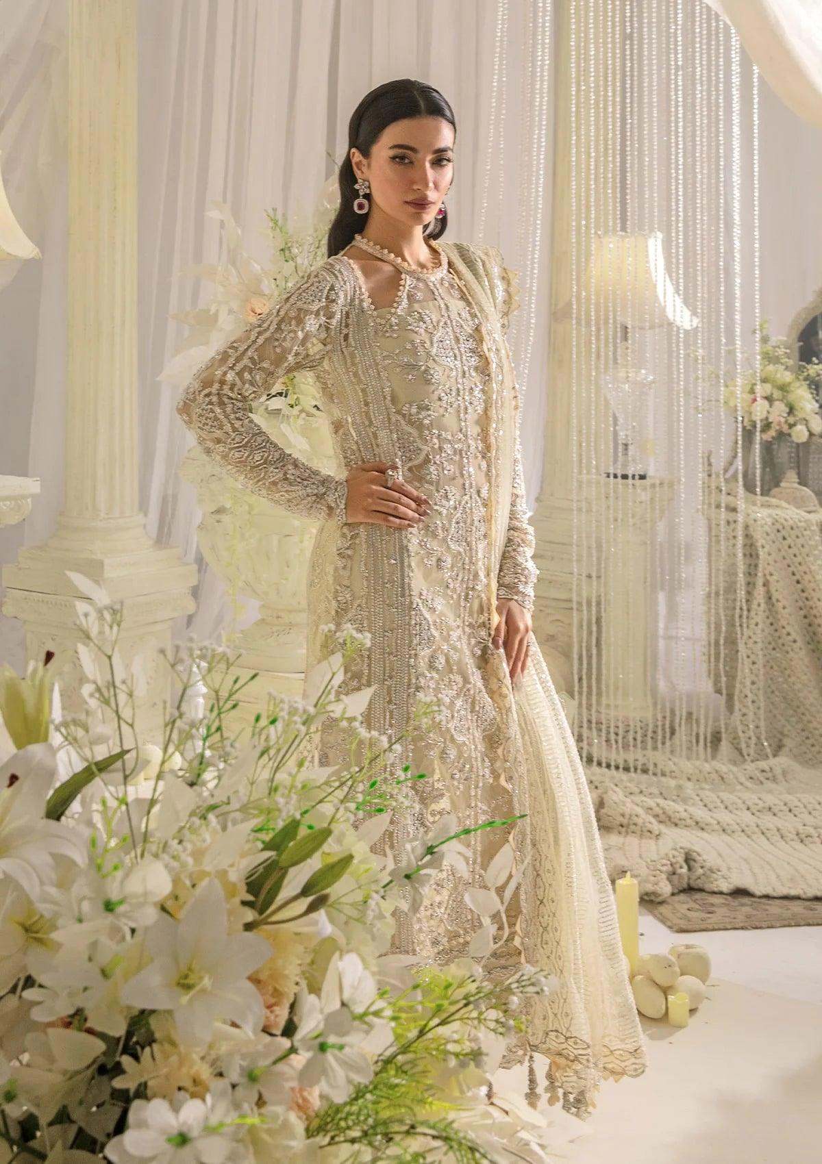 Elaf Evara Aura luxury formal dress in ivory with embroidered hand-embellished front and dupatta, 2024 collection.
