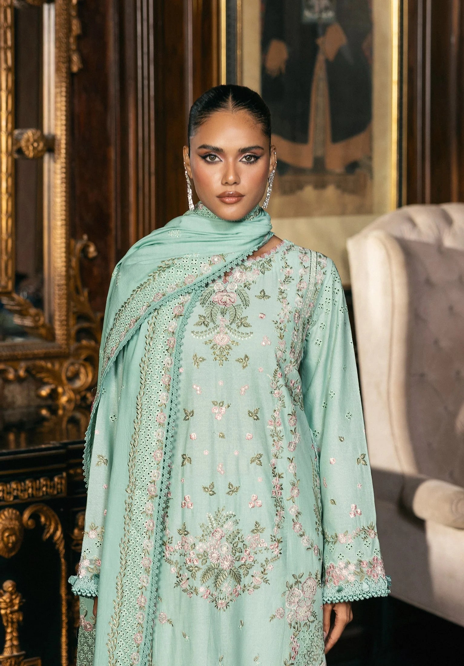 Woman wearing a light green embroidered outfit from Elaf LUXURY WINTER '25